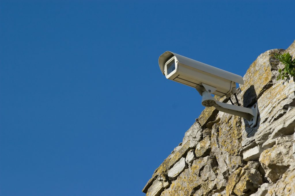 Security video camera above the sky.