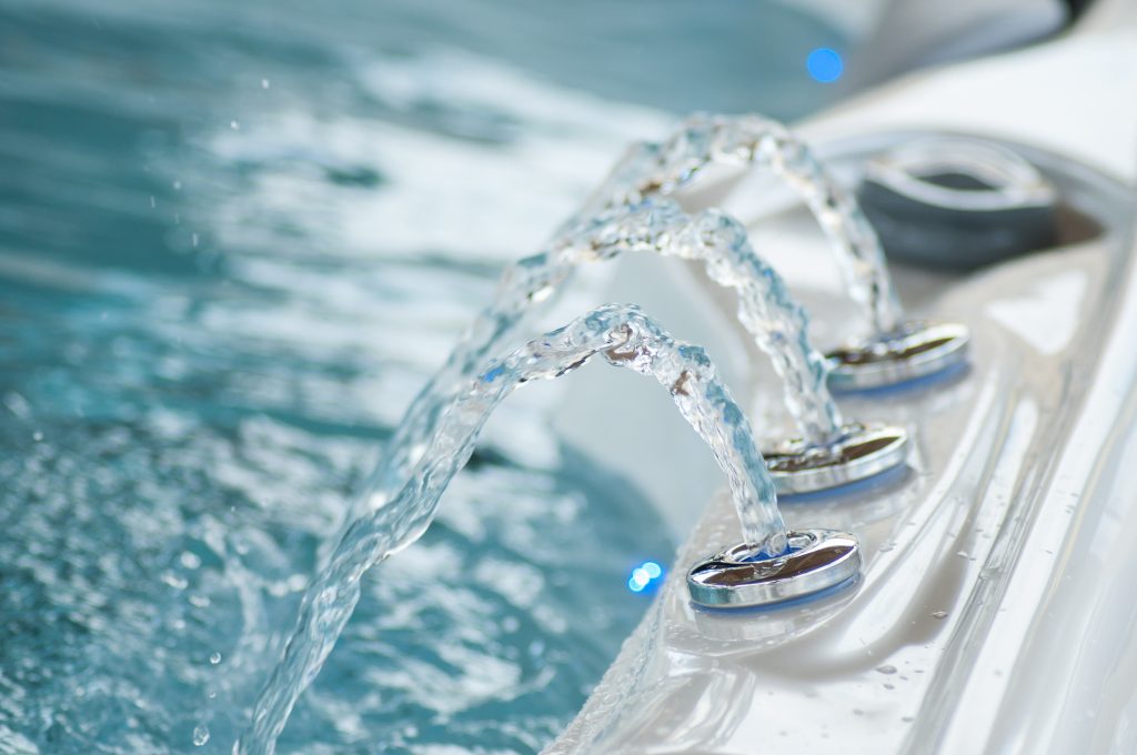 closeup of jet of water in swirl bath